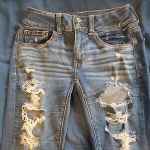 Distressed Blue Jeans